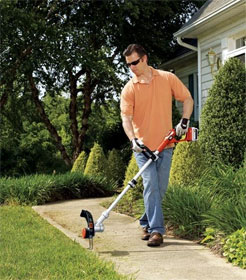 Man using weed trimmer