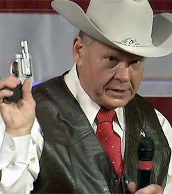 Roy Moore brandishing gun at rally