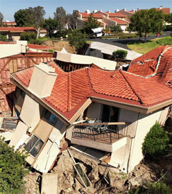 Home collapsing in Southern California landslide