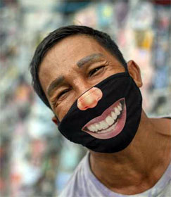 Man wearing funny mask