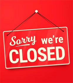 Red "Sorry, We're Closed" sign