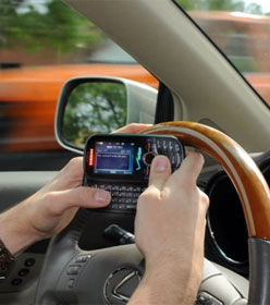 Man texting while driving