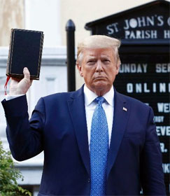 Donald Trump holding a Bible outside St. John's Church, Washington, D.C.