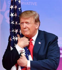 Donald Trump hugging American flag