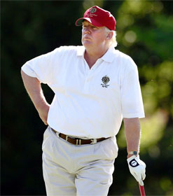 Donald Trump leaning on golf club