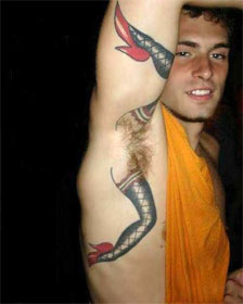 Man with underarm tattoo