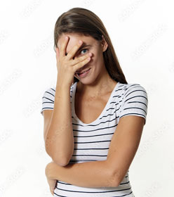 Woman peeking embarrassed